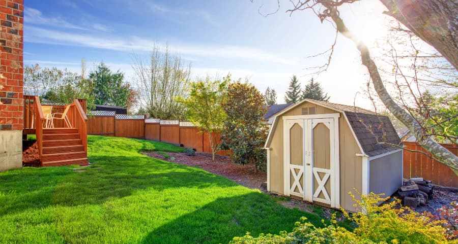 Fenced backyard with storage shed in Gaithersburg